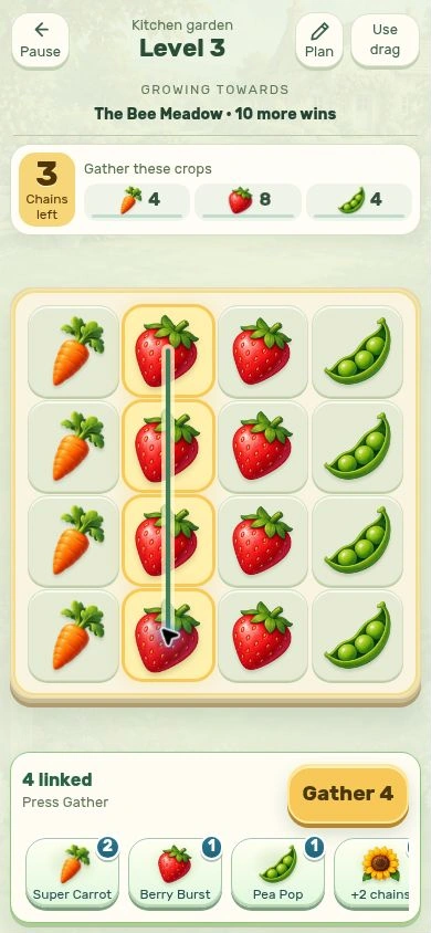 Little Plot level 3: a full board of carrots, strawberries and peas, with a chain of four strawberries selected